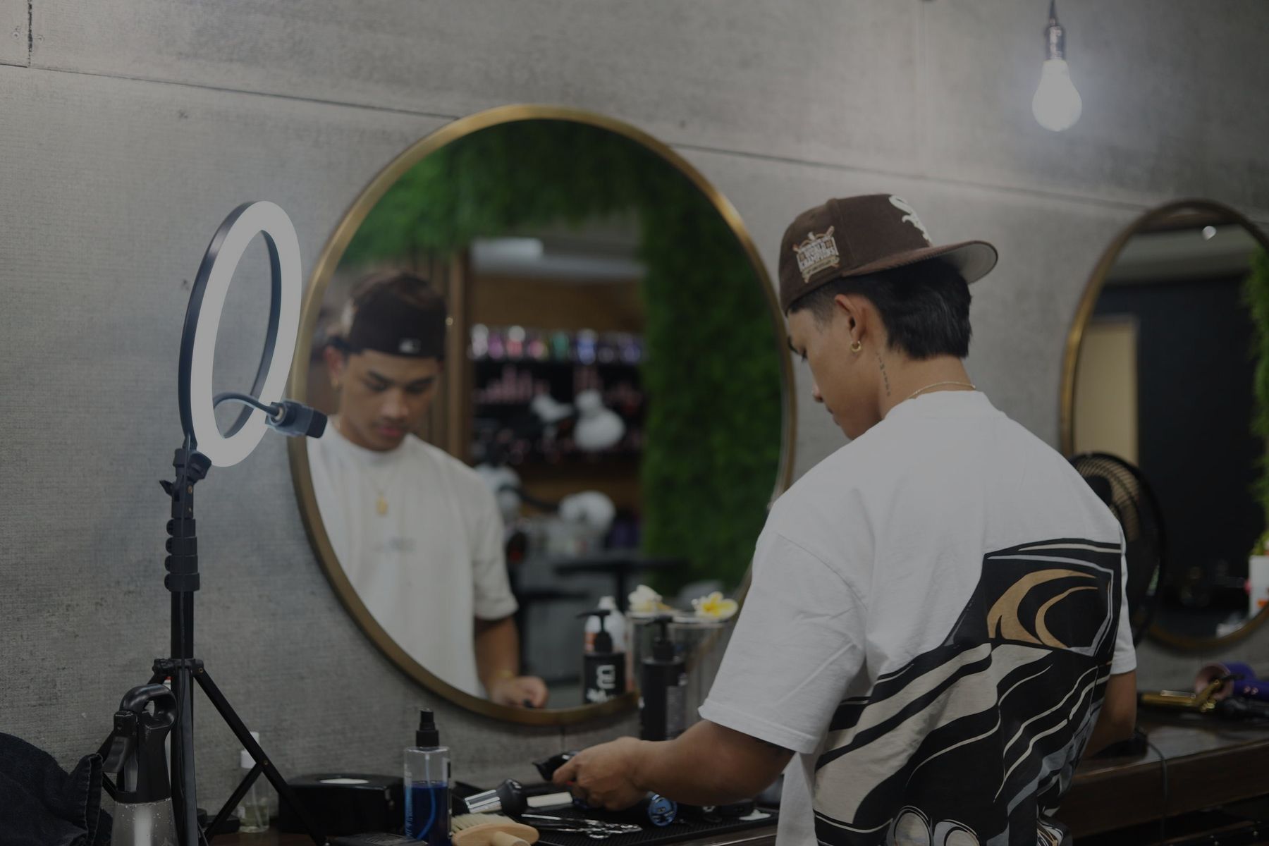 Inside Refined Kulture Studio with gold-framed mirrors